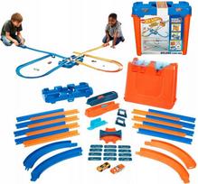 „Hot Wheels“ „Deluxe Stunt Box“ kaskadinių triukų rinkinys su dėže ir 2 automobiliukais GGP93