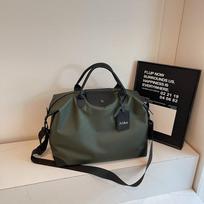 Women Green Waterproof Fabric Travel Duffel Tote Bag Large Weekender Handbag with Top Handle Adjustable Strap for Vacation Gym žalia
