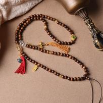 Sandalwood Buddha Pendant Necklace with Black Rosewood, Agarwood, Jade Thangka Pendant, Beaded Chain, and Beeswax brown