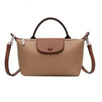 Women's bag 2026 fashion simple versatile messenger hand bag portable bag mobile phone bag makeup women's mini dumpling bag brown