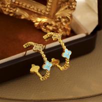 Gold-Plated Four-Leaf Clover Ear Cuffs: Fashionable Micro-Paved Dopamine Earrings, Elegant Light Luxury Jewelry. 18K brown