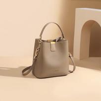 Bag women's new summer bucket bag messenger bag leather high-end large-capacity commuter handheld women's bag beige
