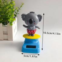 Cartoon Car Ornament: Animal Kala Design with Nodding Head. A Fun Decorative Piece for Your Car and Home pilka spalva