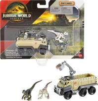 Matchbox Jurassic World žaislinis automobilis arba sunkvežimis-transportuotojas ir dinozaurai: Apima vieną transporto priemonę, įkvėptą „Juros periodo pasaulio“ filmo, ir vieną ar du mini dinozaurus gray