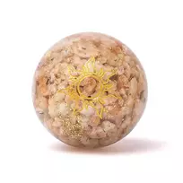 Orgonito sfera su Saulės akmeniu ir Saulės simboliu