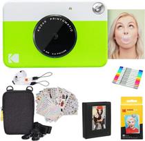 "Kodak Printomatic" momentinio fotoaparato (žalias) dovanų rinkinys + "Zink" popierius (20 lapų) + prabangus dėklas + 7 smagūs lipdukų rinkiniai + žymekliai su dvigubu antgaliu + nuotraukų albumas + pakabinami rėmeliai + patogus dirželis ant kaklo