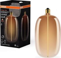 "Osram Vintage 1906 Big Elipse Oval" - reguliuojamo ryškumo LED lempa su elipsės formos kaitinamąja gija, 4,8 W ir 200 lm, E27 lizdas, arbatinis rudas stiklas, 145 mm skersmens, CRI 80, 1800 K.