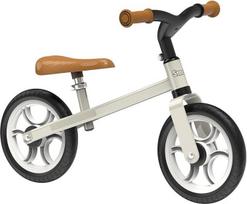 "Smoby" - "First Bike" - reguliuojamo aukščio vaikiškas balansinis dviratukas su "Whisper" ratukais, sėdynės aukštis (32,5-37,5 cm), skirtas vaikams nuo 2 metų