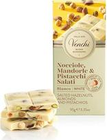 "Venchi" - sūdyto baltojo šokolado plytelė 100 g su Pjemonto lazdyno riešutais, migdolais ir pistacijomis, baltasis šokoladas su 25 % džiovintų vaisių, be glitimo