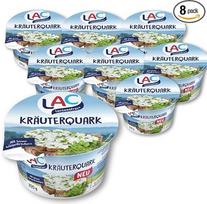 LAC žolelių varškė be laktozės, 4 % riebalų, 8 x 200 g indelių – šviežia varškė su smulkiomis pievų žolelėmis
