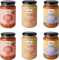 NABIO Šeši trijų rūšių veganiški Azijos padažai: 2 x Chana Masala, 2 x žemės riešutų padažas, 2 x saldžiarūgštis padažas.