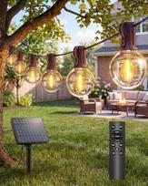 Saulės energija maitinamos lauko girliandos, 36 m (50 + 2) G40 LED saulės energija maitinamos girliandos | IP65 atsparumas atmosferos poveikiui, atsparios smūgiams, su nuotolinio valdymo pultu, reguliuojamas apšvietimo intensyvumas, laikmatis, 3 režimai,
