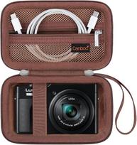 „Canboc“ nešiojimo dėklas, skirtas „Panasonic LUMIX“ ZS99/ TZ99/ LX10/ ZS80/ ZS100/ ZS70/ ZS200/ kompaktiškiesiems fotoaparatams; užtrauktuku užsegamas tinklinis maišelis, kuriame telpa USB laidas ir baterijos, rudas, dėklas