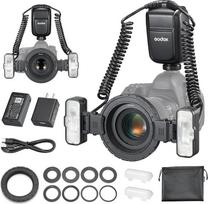 „Godox MF-T76C“ dvigalvis makro fotoaparato blykstė, skirta „Canon“ fotoaparatams, TTL automatinis režimas, 76 Ws, GN22,4, integruotas 2,4 GHz modulis, reguliuojami abu blykstės galvutės kampai 0°–150°, į komplektą įeina baterija, leidžianti atlikti 550 b