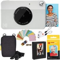 „Kodak Printomatic“ momentinis fotoaparatas (pilkos spalvos) „Deluxe“ komplektas + „Zink“ popierius (20 lapų) + „Deluxe“ dėklas + nuotraukų albumas + kabinamieji rėmeliai + patogus kaklo diržas