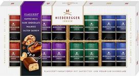 „Niederegger“ marcipano klasikinės variacijos, 1 x 200 g, skoniai: „Kava ir riešutai“, „Tamsus šokoladas“, „Graikiniai riešutai“ ir „Sūdyti anakardžiai“, marcipano dovanų rinkinys