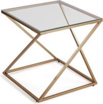 „Versa Trento“ šoninis staliukas, skirtas svetainei, miegamajam ar virtuvei. Šiuolaikiškas žemas staliukas, matmenys 51 x 51 x 51 cm (aukštis x ilgis x plotis). Stiklas ir metalas, auksinė spalva