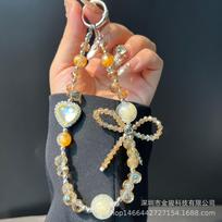 Ins Feng Shui Rhinestone Heart Phone Chain Crystal Bowknot Phone Chain Handmade Beaded Chain Rope New Anti-Lost Rope geltona