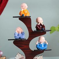 FlowerAura Decorative Set of 4 Adorable Buddha Monk Figurines With Wooden Stand For Peaceful black
