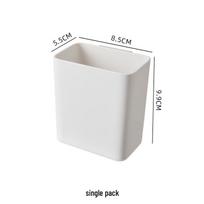 Wall-Mounted Toothpaste and Cosmetic Storage Rack white