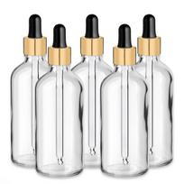 100 ml bespalvis stiklinis buteliukas su auksine aliuminio pipete – 5 vnt. pakuotė