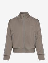 Hummel - Hmljr Reg Poly Tape Girl Zip Jacket - Lengva striukė - Ruda