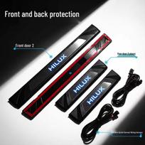 LED apšviestos durų slenksčio juostelės Toyota Hilux Revo - Atsparios įbrėžimams pasitikimo pedalai Blue Light 4-piece Set juoda titano spalva