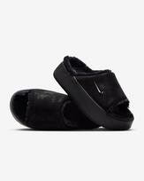 HV8560-001 Nike Calm Elevation Fur Slides Black (Women's) 6W black