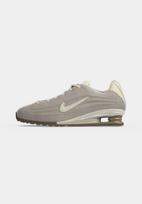 Nike Sportswear Sportbačiai be auliuko 'SHOX Z' kremo / pilka
