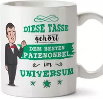 Mugffins puodelis krikštatėviui su vokišku tekstu "bester Patenonkel im Universe" (geriausias krikštatėvis visatoje). Gražus ir juokingas kavos puodelis kaip dovana krikštatėviui, keraminis, 350 ml
