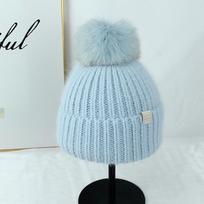 Icelandic fox hairball knitted cold hat female winter flower boy Xin Zhilei Dilizheba wool hat elastic (55-59cm) šviesiai mėlyna spalva