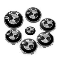 BMW Black & White Carbon Fiber 7-Piece Set: Front Emblem, Wheel Hub Caps, Steering Wheel Sticker, Rear Tail Emblem. Black and White Carbon Fiber Wheel Hub Cap 68mm gray