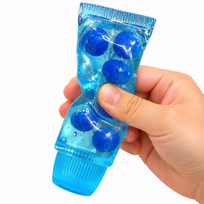 Antistresinis žaislas Squishy – dantų pastos tūbelė su mėlynėmis
