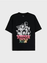 Sinsay - Medvilniniai „oversize“ marškinėliai su „Stranger Things“ spauda - juoda