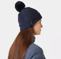 Moteriška megzta kepurė su bumbulu Helly Hansen Lumi Beanie