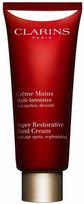 Clarins Super Restorative jauninamasis rankų kremas 100 ml.