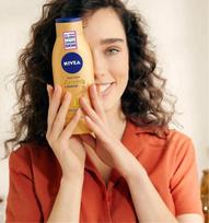 idegio sviestas - Nivea Q10 Plus Firming + Bronze 400ml Moterims Kūno losjonai - 7 nuotrauka