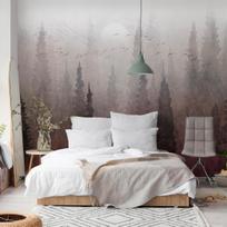 Fototapetas Artgeist Bird's flight over treetops - landscape of a dark forest in fog, 175 cm x 245 cm