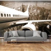 Fototapetas Artgeist Airplane Taking Off From The City 4XLFTNT1407, 309 cm x 309 cm
