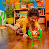 interaktyvi bezdzionele - Bright Starts Roll & Glow Monkey Toy 52181 - 2 nuotrauka